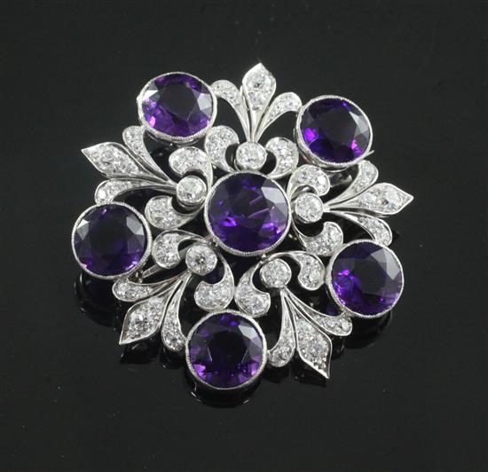 An attractive Tiffany & Co white gold?, amethyst and diamond flower head pendant brooch, 38mm.
